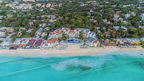 Fisherman's boutique resort-condo complex- just 55 units & large sandy beach