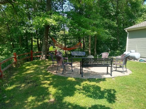 Campfire area with nearby hammock, just steps from the house