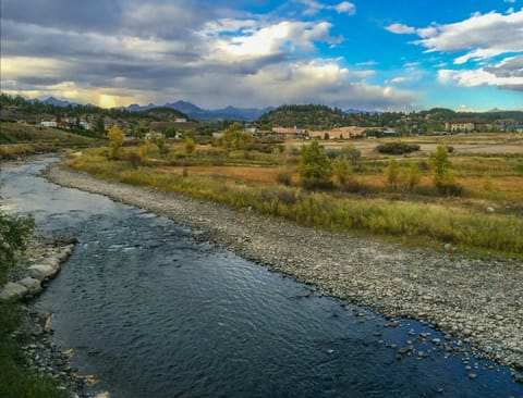 An incredible view of the river, downtown and the mountains ALL from the deck!