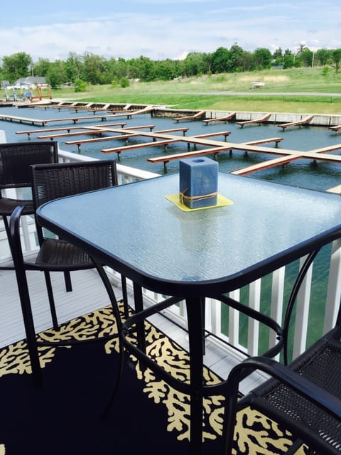 Sitting Area on Balcony with 3-Burner Propane Grill