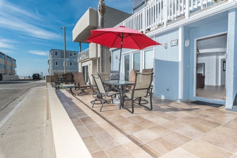 Ocean view from the coveted 34th Street front patio, two houses back from beachfront and boardwalk; includes outdoor dining, propane bbq grill, market umbrella.
                
