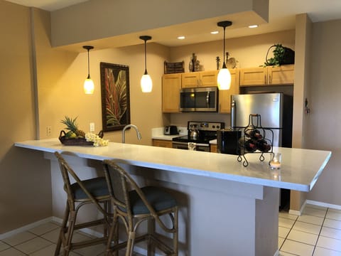 Renovated kitchen with built in bar