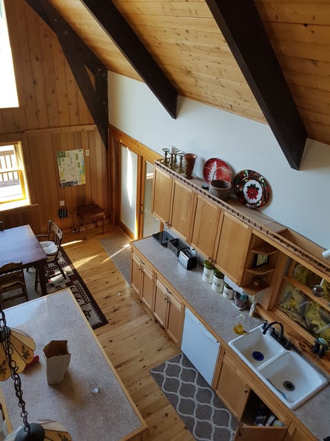 Looking down from the loft to the kitchen