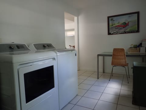 Mud room at entry with new washer & dryer.