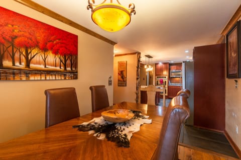 Another view of the oversize dining room table for home cooked meals