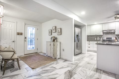 Front Entry - Walk in through the front door into the open floor plan kitchen and dinning area. You will feel at home as soon as you step in and close the door.