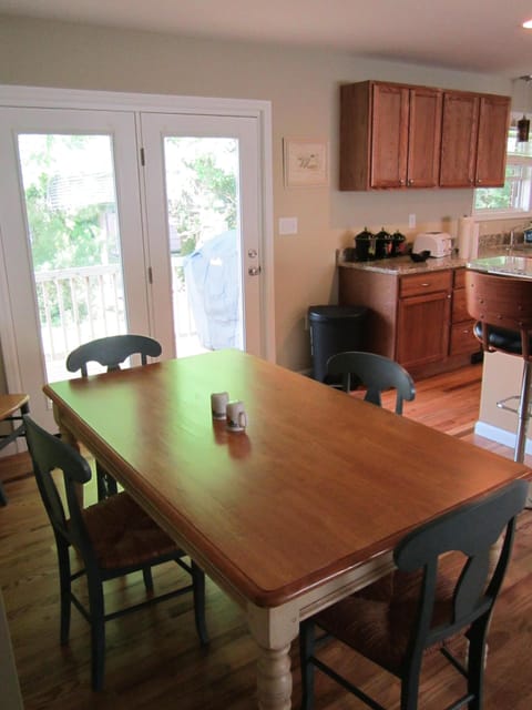 Dining for six with plenty of spare chairs.. grill outside if you prefer