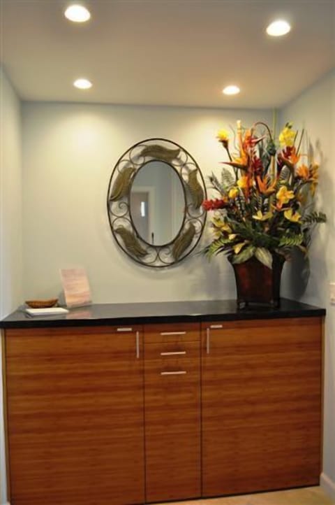 Entry Foyer with custom bamboo cabinetry and full size washer and dryer