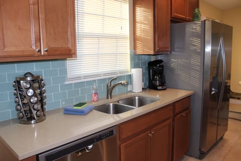 Pretty kitchen with solid surface counters & Stainless appliances