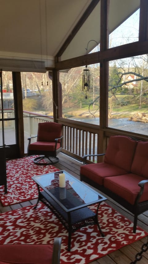 View of the river from the screened-in deck off of the Master Bedroom