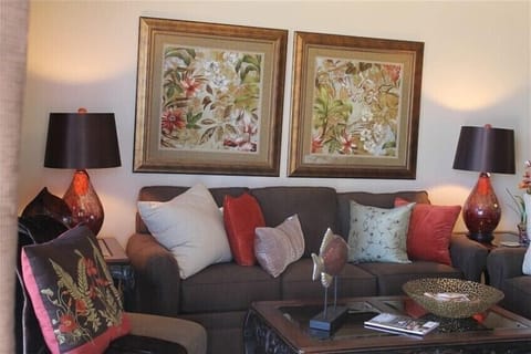 Nice comfy sofa in living area with beautiful mosaic lamps and great ocean views