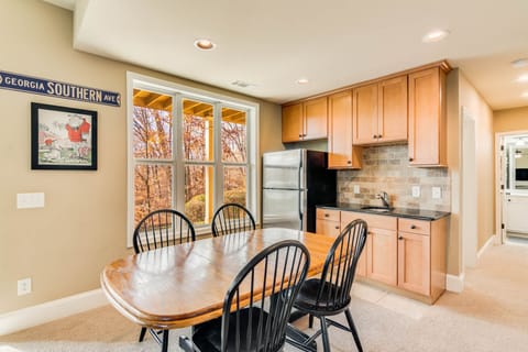 Extra refrigerator comes in handy. Table is   perfect for games or eating.