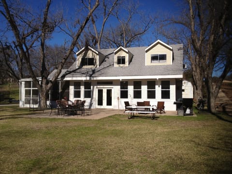 Our old pecan trees are full of leaves in summer for a shady place to relax!