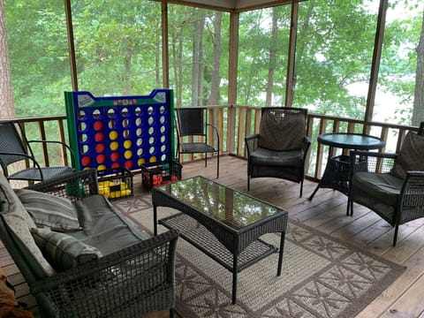 Screened Porch with life size connect 4 game