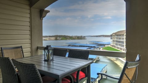 Relax on your top floor, covered balcony overlooking the lake