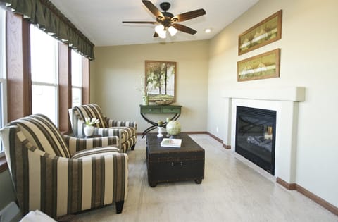 Sunroom overlooking the lake with double fireplace