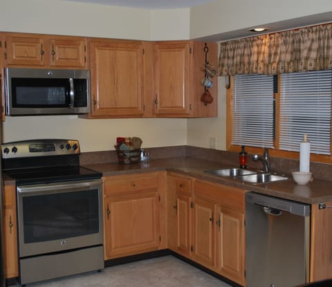 Home entrance is through foyer into kitchen. Drop spot for coats, boots etc. 