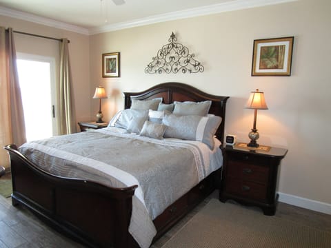 Master Bedroom, king bed with beach view and access to balcony 