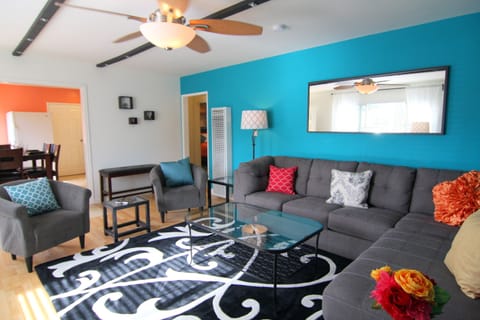 Living area, bright and spacious. Sofa has a sleeper bed.