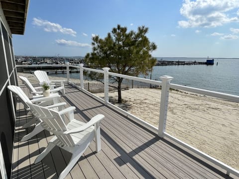 Southwest view of Rehoboth Bay and the Snug Harbor Condo private beach