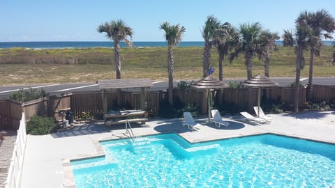 Beautiful view of pool and ocean from second floor balcony.