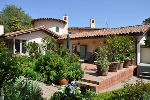 The sunny patio and garden are easily accessed from most rooms in the house.