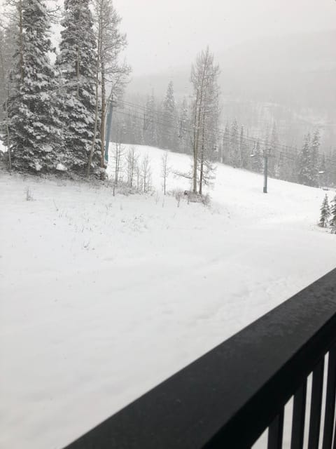 On our Patio with Ski Slope at your Feet & the Main Chair Lift right there. 