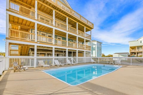 Multi-story beach house with private pool and expansive decks perfect for coastal getaways.