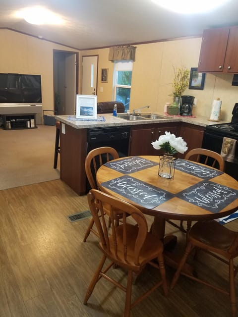 From the kitchen, looking into the den.