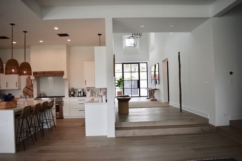 Huge open floor plan Great/living room, dining & kitchen lead to multiple patios