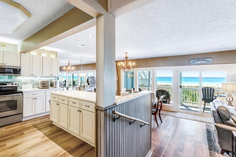 Wall of windows looking out at beautiful beach views