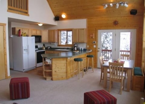 Open living space on main floor with kitchen - mountain views to the right!
