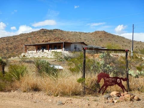 Front View of Property with Property Sign