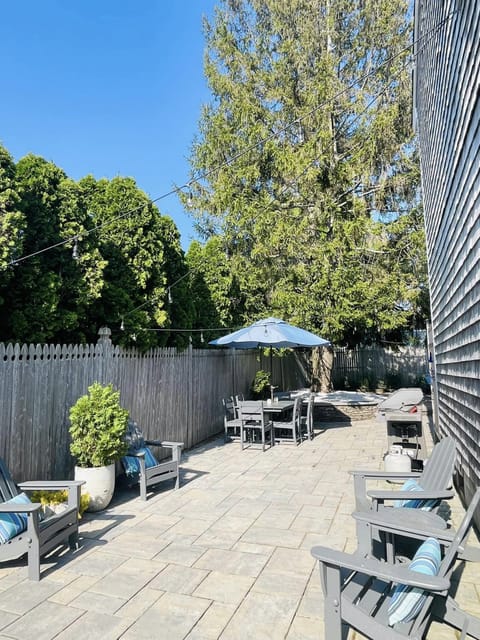 1000 sq ft patio. Outdoor shower. Grill.
