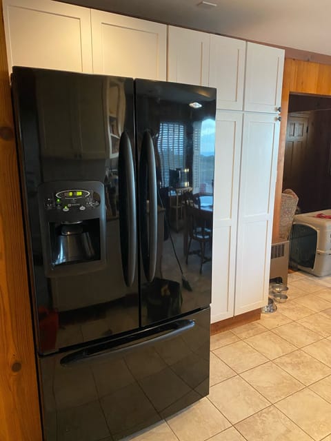 New, large refrigerator plus ice/water.
