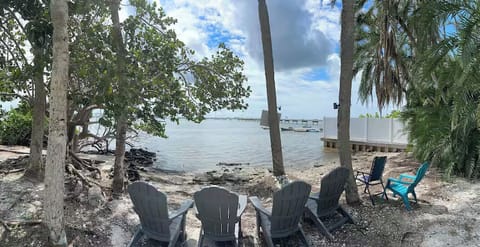 Waterfront beach area shared exclusively by guests of the three vacation rentals