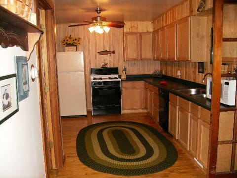 large kitchen, laudry room is to the left of the refrigerator and back entrance. 