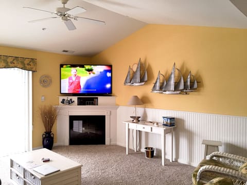Professionally decorated with 60" TV and Blu Ray Player with BD disk library!
