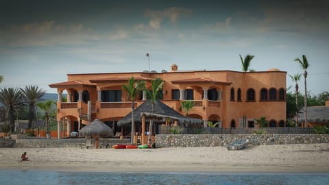 Fully staffed ultimate luxury villa on golden soft sand and warm sea.