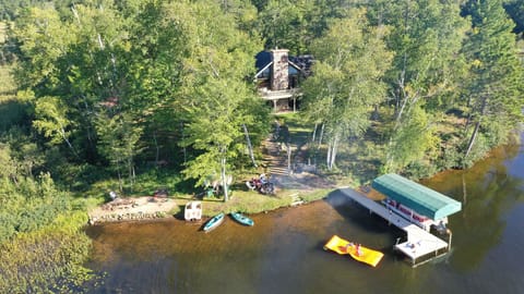 Gresham Retreat sits on a private peninsula with a waterfront gathering space