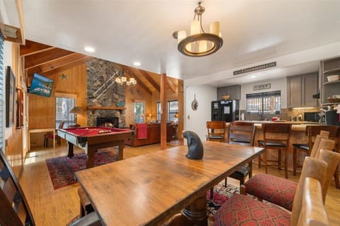 Dining table that faces the kitchen and living area