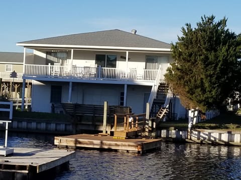 View from the canal with standing dock and floating dock.