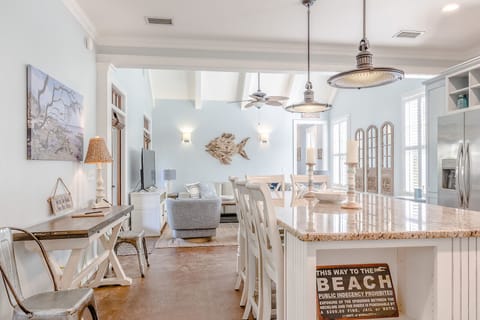 An open floor plan connects the kitchen to the living space.