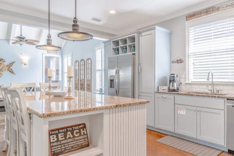 The eat-in kitchen is perfect for gathering together.