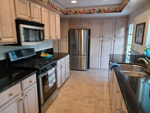 Upgraded granite and appliances with ice maker, blender, and 14 cup coffee maker