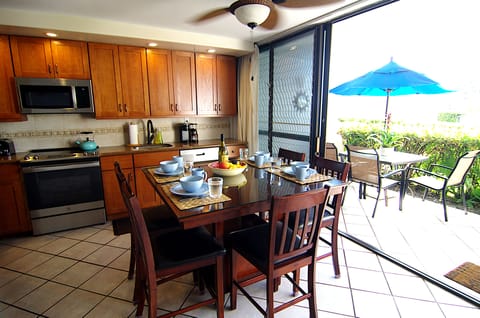 Kitchen opens up to the lanai.