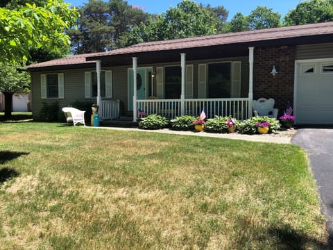 Extra-large front yard with private heated pool in backyard