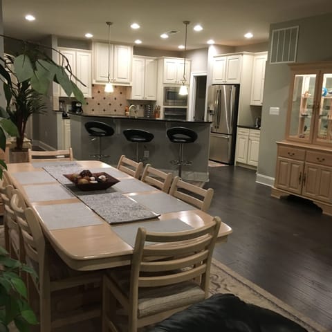 View from Great Room showing dining table and kitchen.