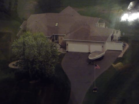 Ariel View...Property is on a 1.2 acre lot with 117 feet of frontage on the Lake