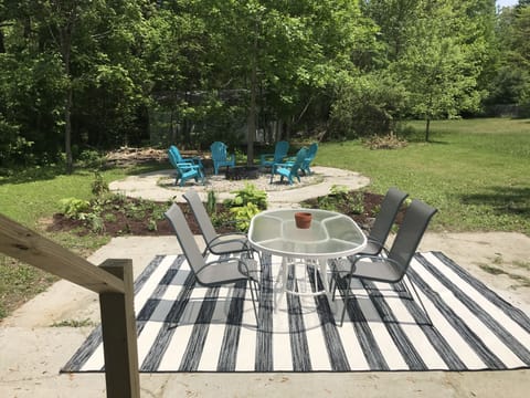 Large backyard with woods, w/ large gas grill, fire pit and outdoor shower 